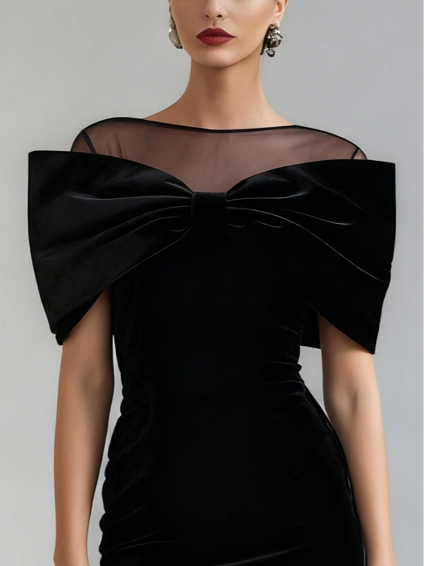 Elegant black velvet mini dress with bow